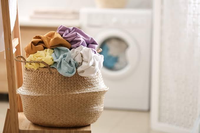 A basket of laundry ready for careful washing